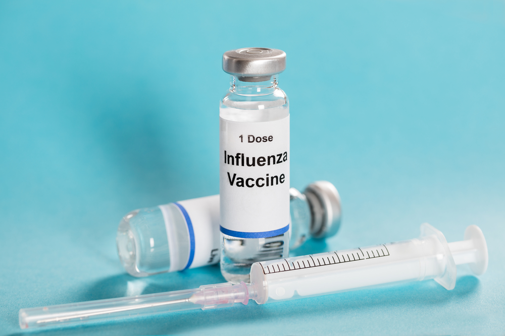 Influenza Flu Vaccine Vials With Syringe