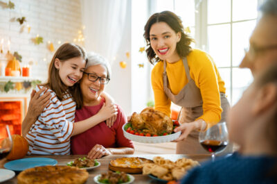 Happy,Thanksgiving,Day!,Autumn,Feast.,Family,Sitting,At,The,Table